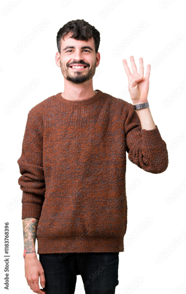Φωτογραφία Young handsome man wearing winter sweater over isolated background showing and pointing up with fingers number four while smiling confident and happy