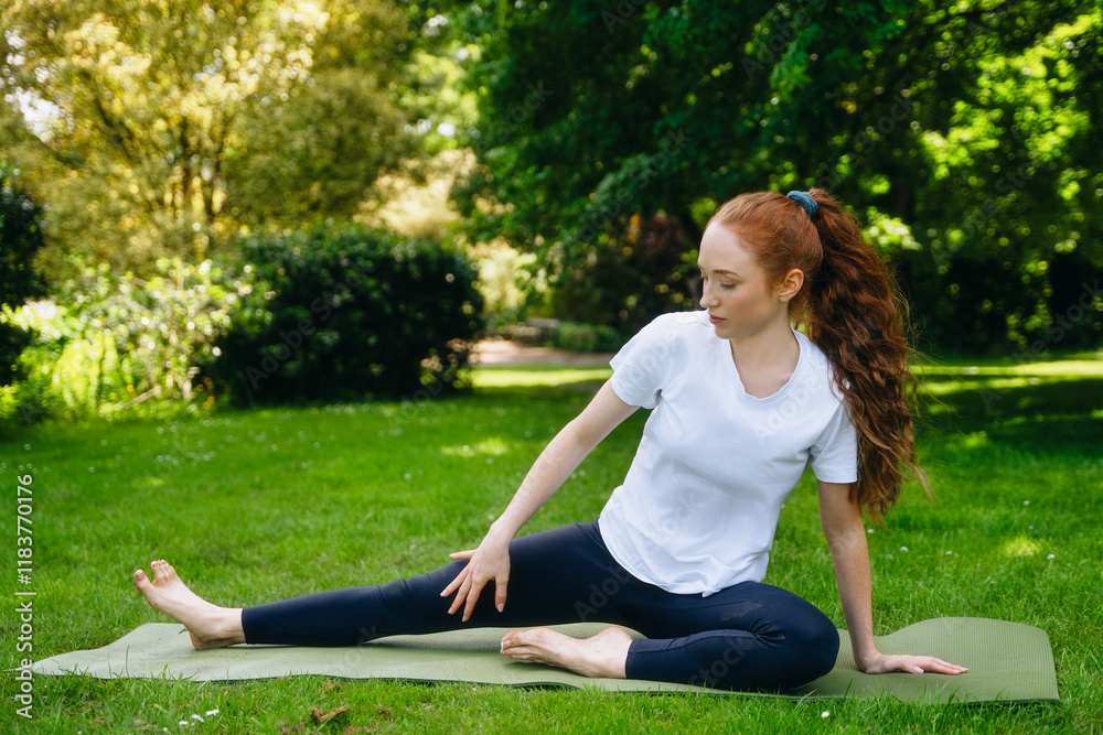 Woman practicing yoga in a serene garden during sunny afternoon hours Woman practicing yoga in a serene garden during sunny afternoon hours