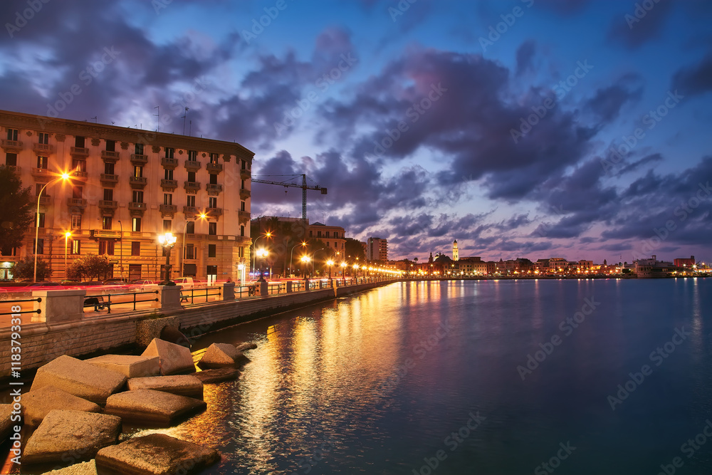 Obraz premium view of Bari, Southern Italy, the region of Puglia, Apulia seafront at dusk. Basilica San Nicola in the background.