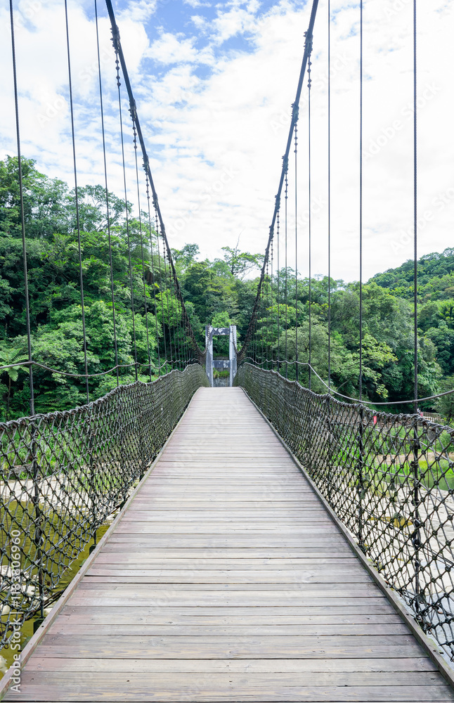 Sunny view of the Guanpu Suspension Bridge