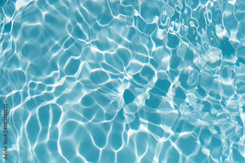 Blue water with ripples on the surface. Defocus blurred transparent blue colored clear calm water surface texture with splashes and bubbles. Water waves with shining pattern texture background. Blue water with ripples on the surface. Defocus blurred transparent blue colored clear calm water surface texture with splashes and bubbles. Water waves with shining pattern texture background.