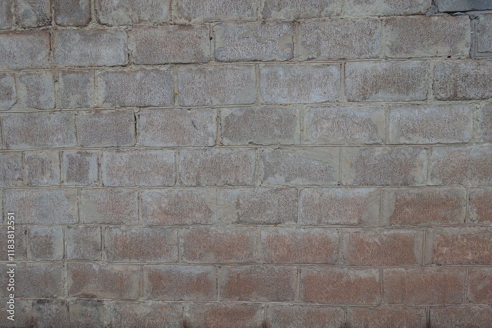 Uneven surface of whitewashed wall made of concrete masonry units Uneven surface of whitewashed wall made of concrete masonry units
