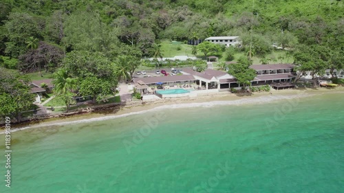 High-angle view of the Caribbean island of Tobago's stunning blue waters inn beach. photo