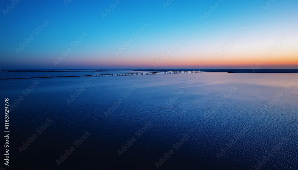 Aerial view of the Oresund Bridge with a clear blue sky