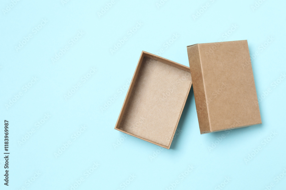 Open cardboard box on color background Open cardboard box on color background