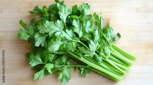 Fresh Celery Stalks on Wooden Cutting Board