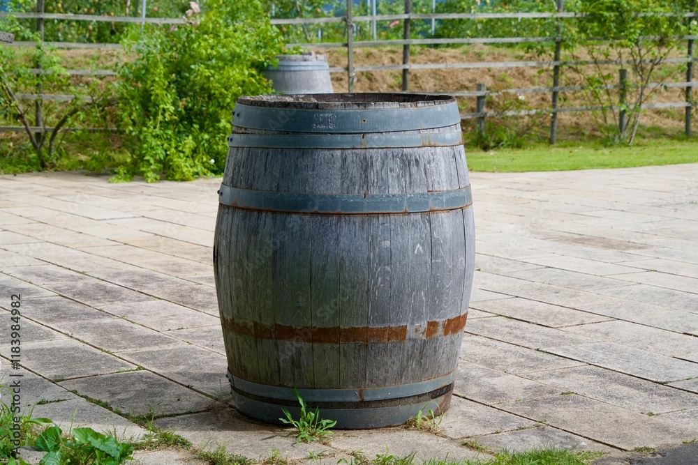 Large wooden barrels placed in the aisle Large wooden barrels placed in the aisle