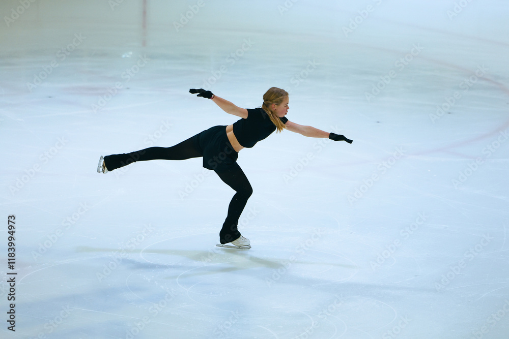 Figure skating girl training on ice arena. Figure skating girl training on ice arena.