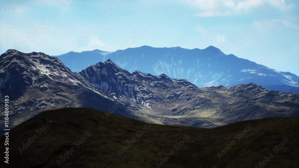 The landscape showcases rugged mountain peaks with varied textures, bathed in natural light under a clear blue sky. The vastness offers a serene and untouched view of nature. The landscape showcases rugged mountain peaks with varied textures, bathed in natural light under a clear blue sky. The vastness offers a serene and untouched view of nature.