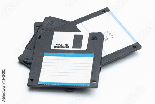 A clean and clear image of a vintage floppy disk set against a plain white background.