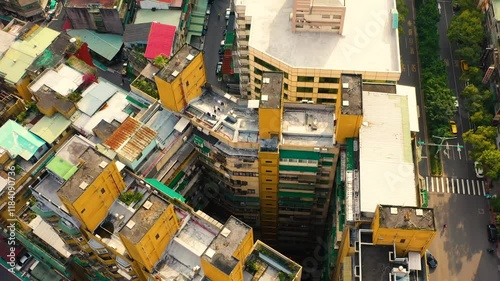 TAIWAN, CHINA - JANUARY 7, 2025: Aerial view of urban buildings showcasing vibrant architecture and bustling streets in a lively neighborhood
