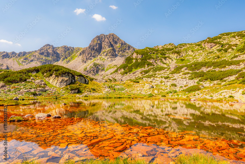 Mountain landscape in National Park Retezat, Romania. Hiking to Lacul Bucura througth Cabana Gențiana. Taul Pietrele