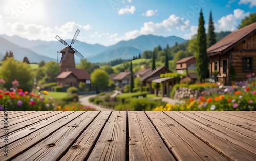 Wooden Podium Overlooking a Charming Village with a Windmill and Mountain Views