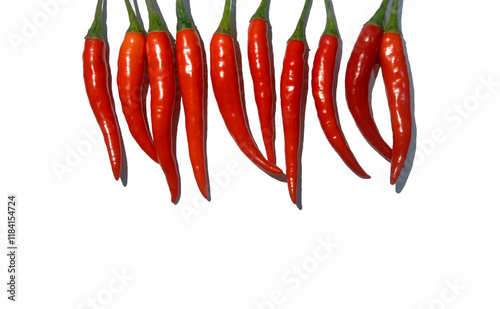Fresh red chili peppers prepared for cooking. White background photo.