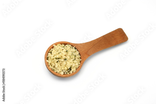 Shelled Hemp Seed in a wooden spoon isolated on white. Hemp hearts isolated - Healthy Nutrition