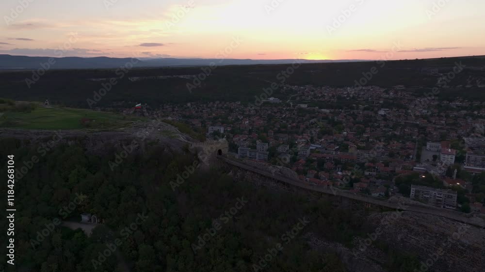 Aerial view of Ovech Fortress at sunset surrounded by forest and village, Provadia, Bulgaria. Aerial view of Ovech Fortress at sunset surrounded by forest and village, Provadia, Bulgaria.