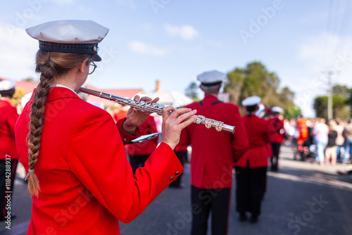 Flautist playing flute in ANZAC Day parade with local band photo