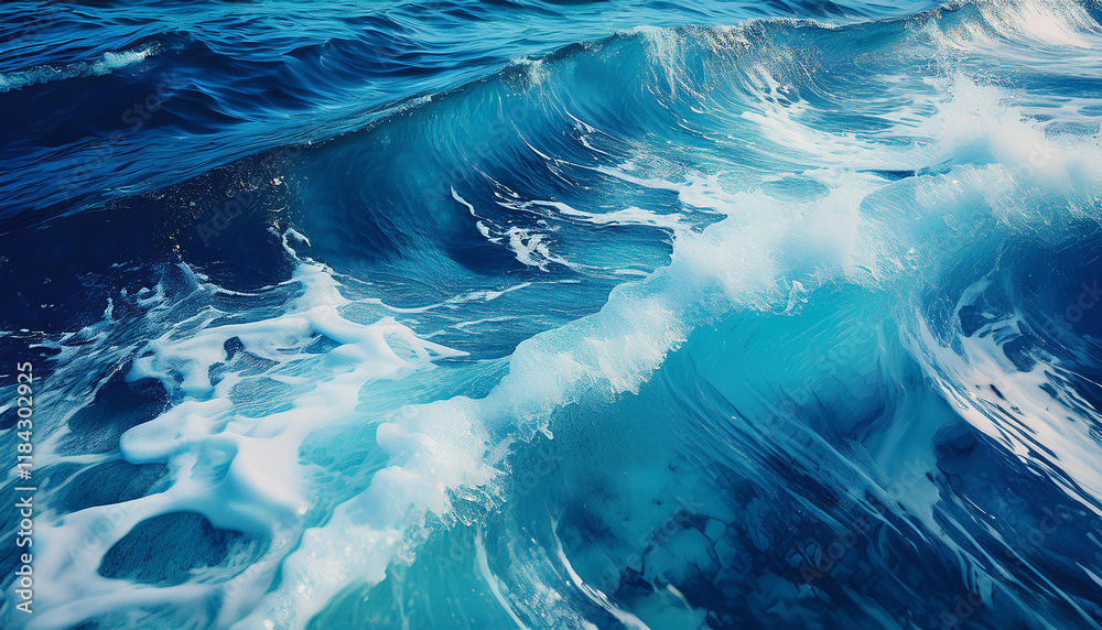 Patterns of turquoise seawater with the movement of waves and foam