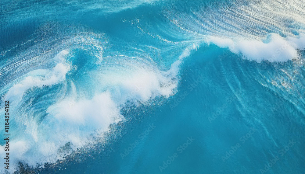 Patterns of turquoise seawater with the movement of waves and foam