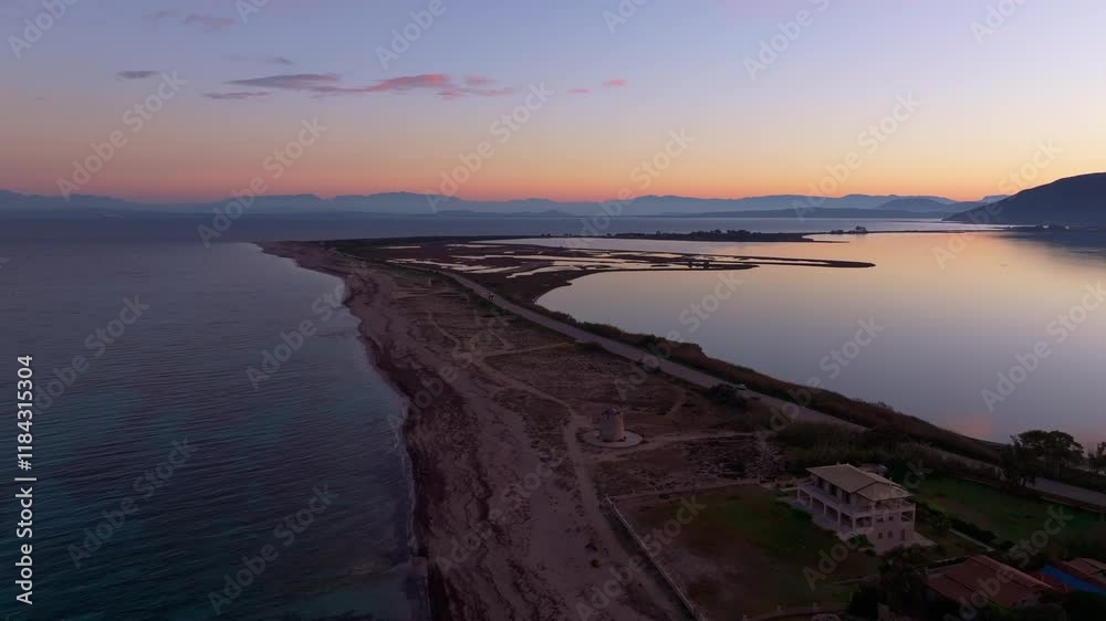Aerial view of lefkada windmills at sunrise over the tranquil ionian sea, lefkada, greece. Aerial view of lefkada windmills at sunrise over the tranquil ionian sea, lefkada, greece.