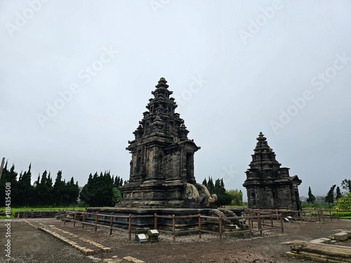 Dieng, Banjarnegara Indonesia - December 28, 2024:The Arjuna Temple is in Dieng Kulon, Banjarnegara, Central Java. It's an old Hindu temple from the time of the ancient Mataram Kingdom. photo