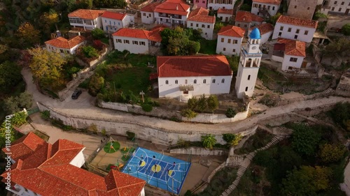 Aerial view of the beautiful medieval village with traditional stone houses and a church, Dhermi, Albania. photo