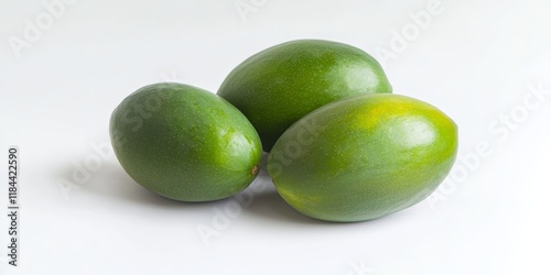 Wallpaper Mural Fresh green mango isolated on a white background showcases the vibrant color and unique characteristics of the fresh green mango. This fresh green mango stands out beautifully in any composition. Torontodigital.ca
