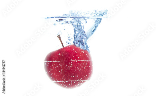 Fresh red apple splashing into water on white background