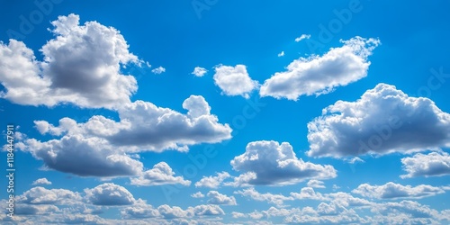 Cumulus clouds in a clear blue sky create a picturesque view, showcasing the beauty and tranquility of cumulus clouds set against a vibrant blue sky. Perfect for capturing the essence of nature.