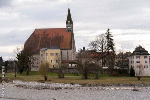 View of the Salzach River from Oberdorf Bei Salzburg Austria, looking over at a church in Laufen, Germany photo