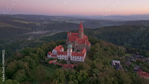 Wallpaper Mural Aerial view of Bouzov Castle at sunrise surrounded by tranquil forest and hills, Bouzov, Czech Republic. Torontodigital.ca
