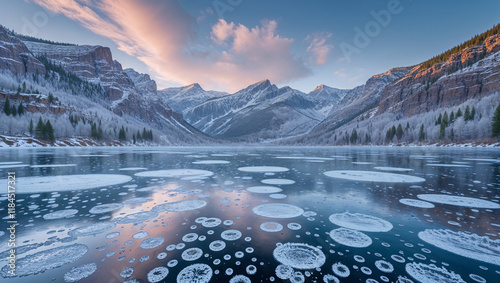 Frozen methane bubbles creating stunning circular patterns on a lake at sunrise