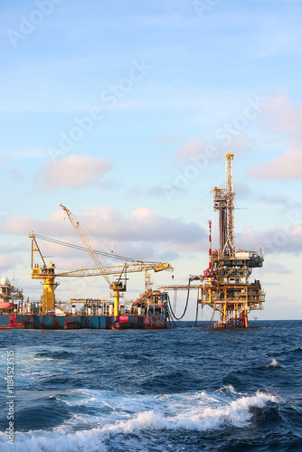 Oil and rig in offshore or the sea. The construction platform for production oil and gas in power and energy industry. Heavy industry and hard work every day.