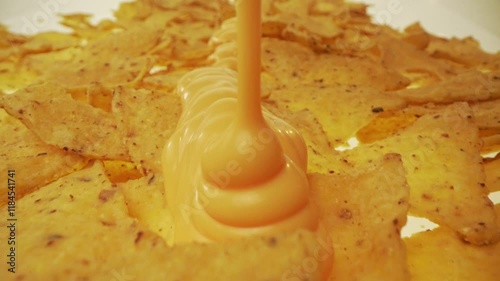 laowa traveling in over nachos dipped with cheese