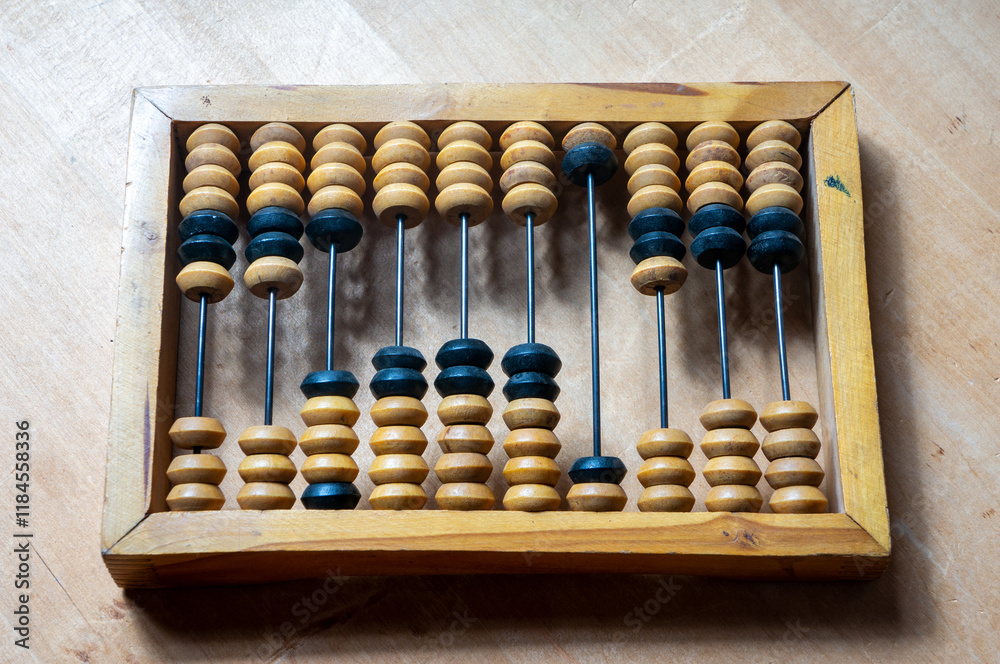 wooden abacus on a wooden table wooden abacus on a wooden table