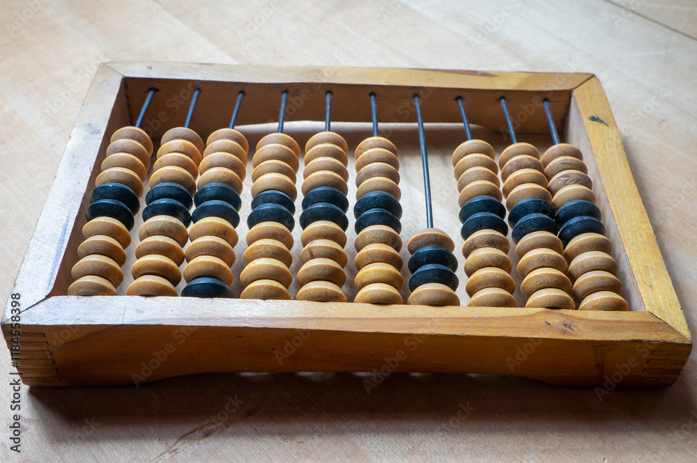 wooden abacus on a wooden table wooden abacus on a wooden table