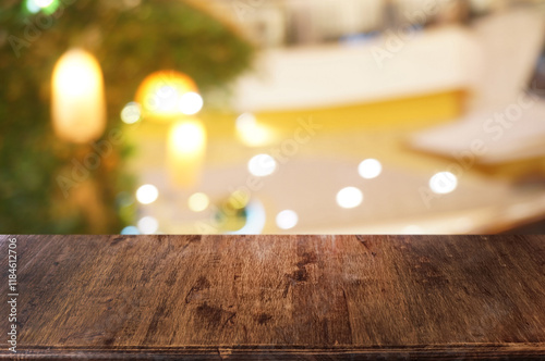 Empty dark wooden table in front of abstract blurred boken bankground of restaurant. Can used for display or montage your products. Mock up for space.