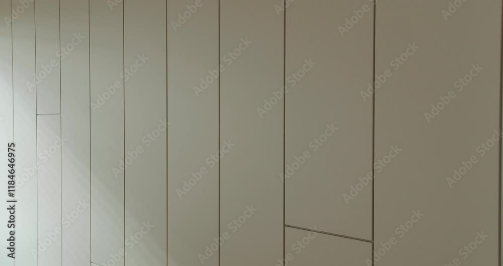 Minimalist White Wall Panels with Elegant Shadow Play. A clean and sophisticated image of minimalist white wall panels with subtle shadow play, creating a calm and elegant ambiance. Minimalist White Wall Panels with Elegant Shadow Play. A clean and sophisticated image of minimalist white wall panels with subtle shadow play, creating a calm and elegant ambiance.