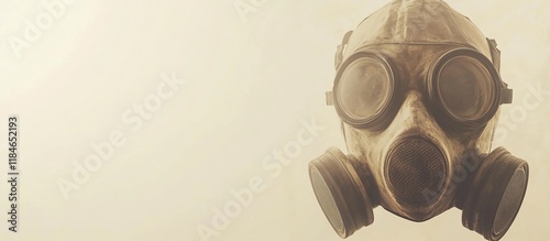 Vintage gas mask against hazy background.