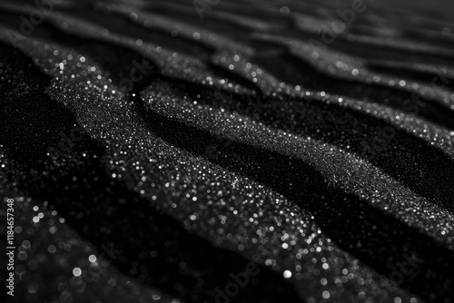 Monotone Grit: Black Grainy Texture Background with Glittering Sand photo