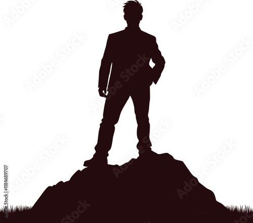 Silhouette of a Man Standing on a Rock