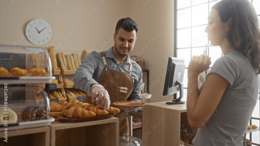 Man serving woman in a bakery with fresh pastries and bread display, creating a warm indoor atmosphere of customer service and interaction. Man serving woman in a bakery with fresh pastries and bread display, creating a warm indoor atmosphere of customer service and interaction.