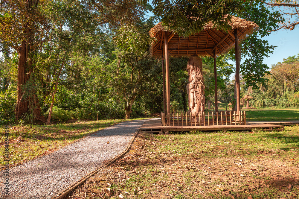 Mayan stelae inside the Quiriguá archaeological park, protected by a structure made of organic materials. Mayan stelae inside the Quiriguá archaeological park, protected by a structure made of organic materials.