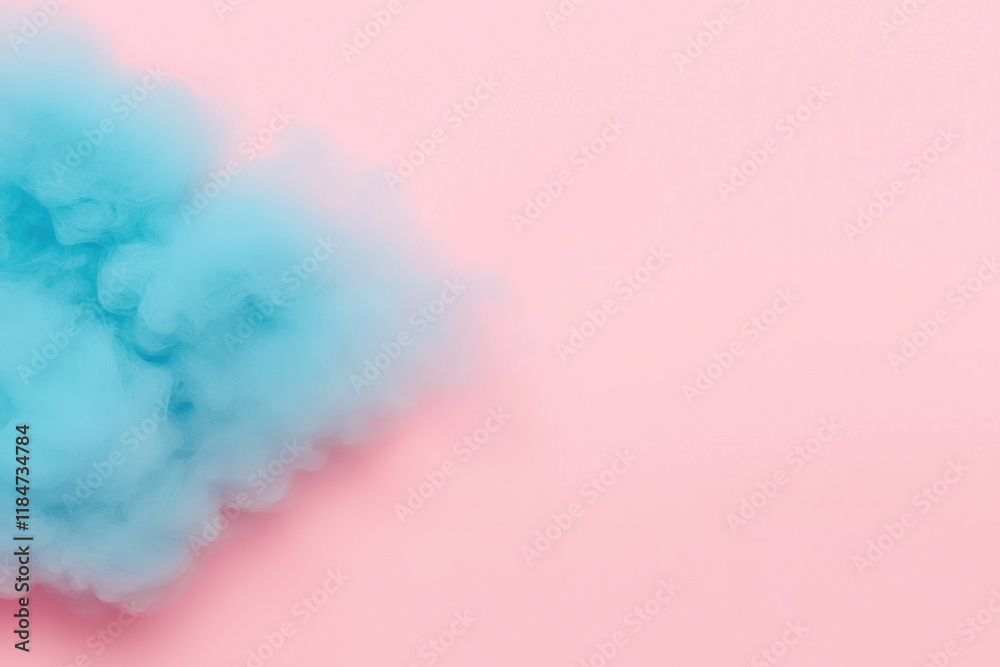 Naklejka premium A vibrant blue smoke cloud against a soft pink background, perfect for creative designs.