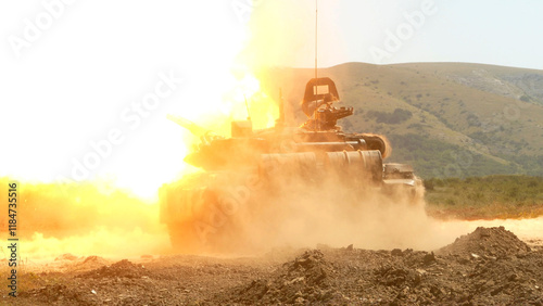 heavy tank fires a gun in battle