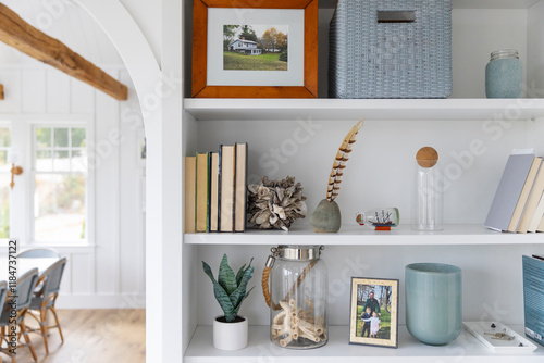 Modern Cottage home shelf decor with feather and frame photo 