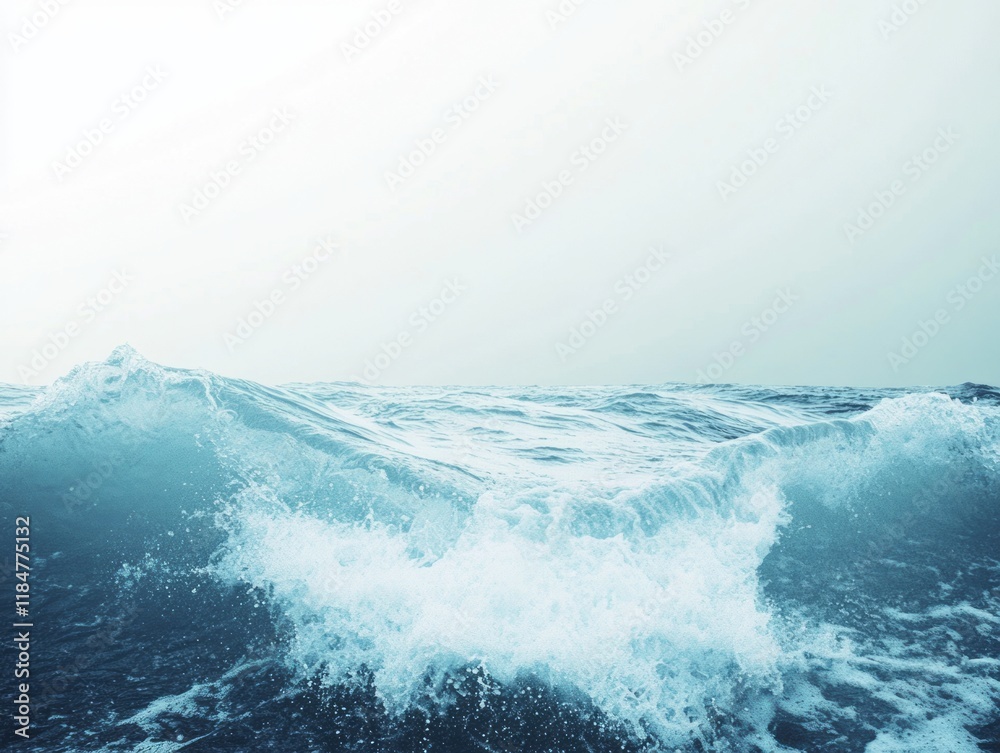 Fototapeta premium Ocean Waves Crashing Under a Pale Sky