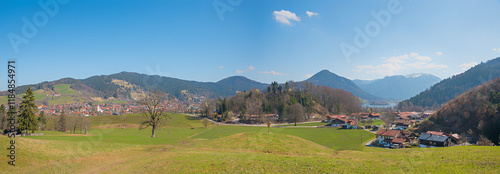 idyllic view to spa town Schliersee and Breitenbach district, early spring landscape photo