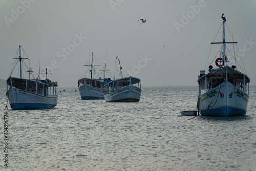 Fishing boats in Juan Griego Bay at sunset. Margarita Island, Venezuela. photo
