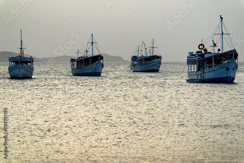 Obraz na płótnie Fishing boats in Juan Griego Bay at sunset. Margarita Island, Venezuela. w salonie